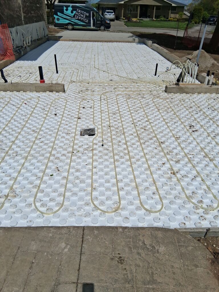 Infloor heating for a new Garage & Washroom addition with a 3 season room  