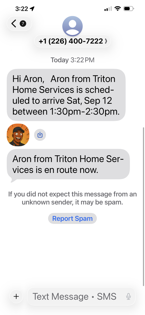 Screenshot of an automated SMS notification from Triton Home Services confirming technician dispatch and scheduled arrival window.